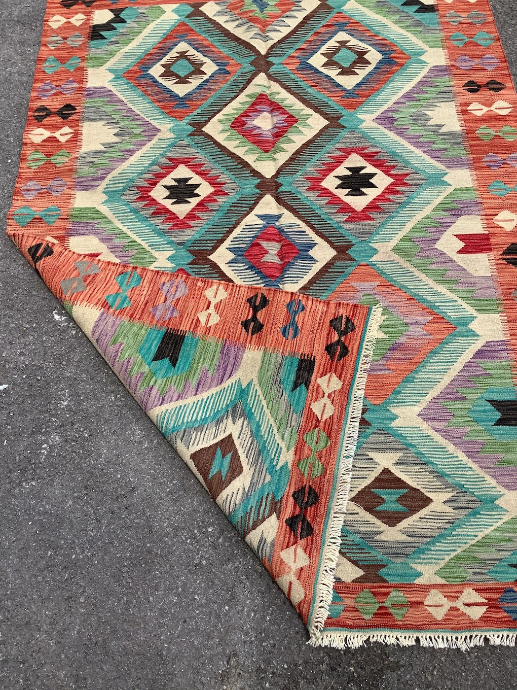 An Anatolian design polychrome flatweave Kilim carpet, 212 x 152cm